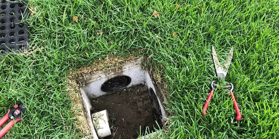 installed in a drainage system in a lawn