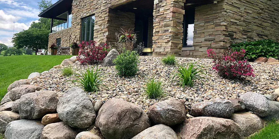Installed dry creek bed in the backyard