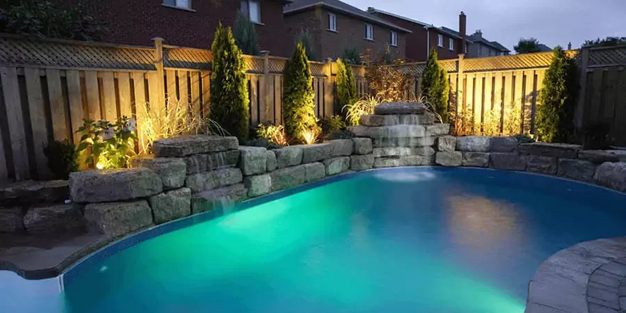 Installed pool landscaping and lighting